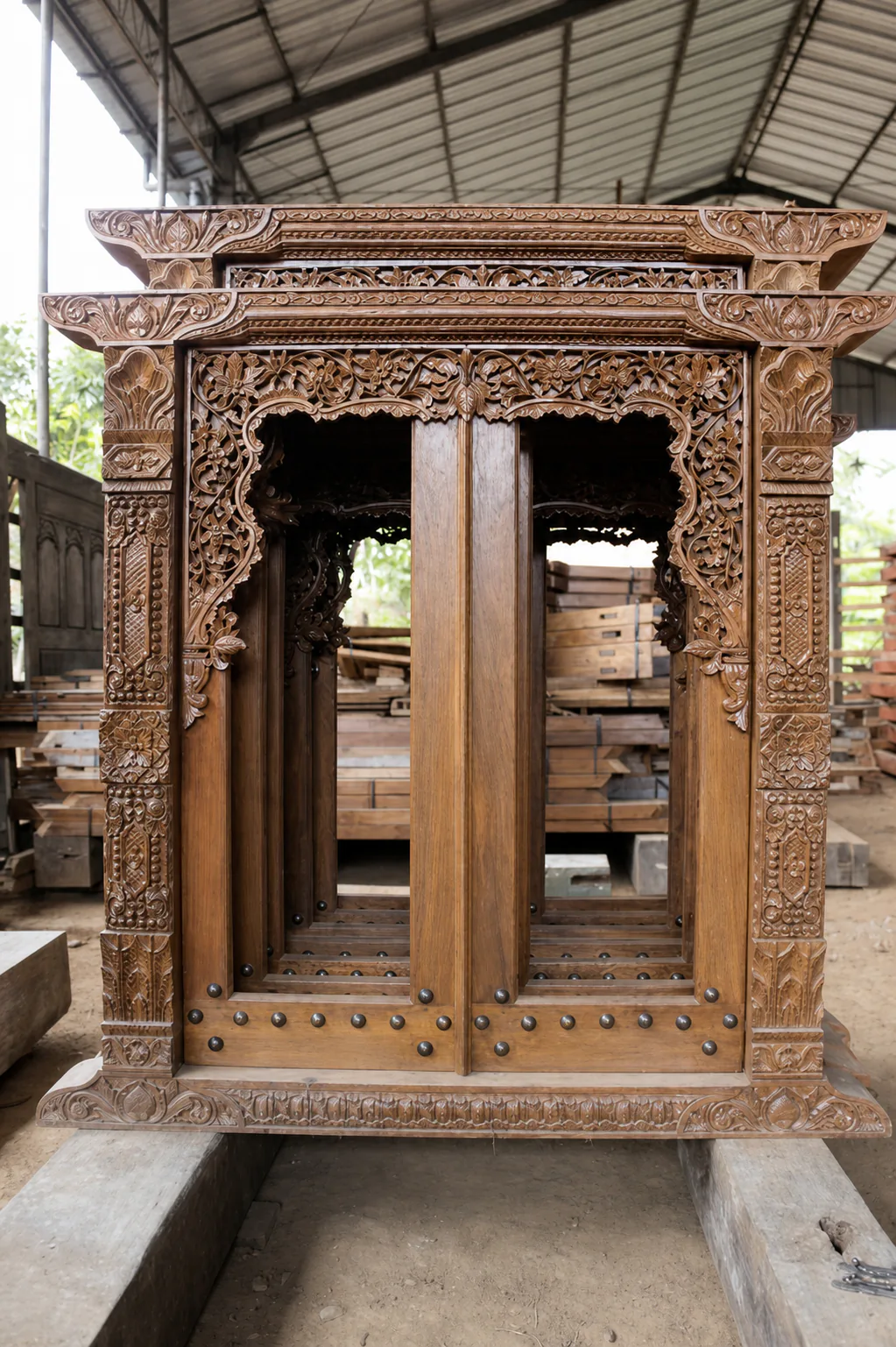 Detailed bespoke carved teak opening